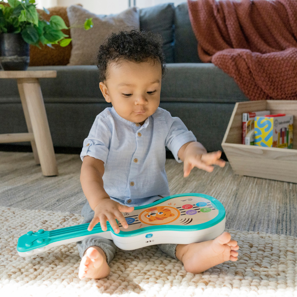 Jucărie educațională Baby Einstein „Ukulele magice”