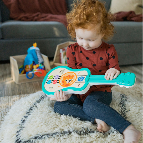 Jucărie educațională Baby Einstein „Ukulele magice”