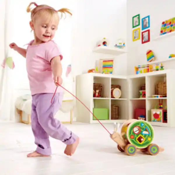 Детская каталочка-сортер на веревочке “Улитка”