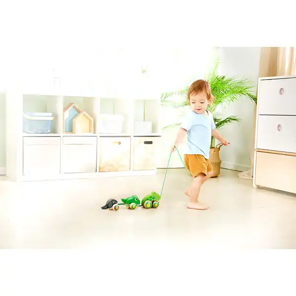 Детская каталочка на веревочке «Семья лягушек на прогулке»