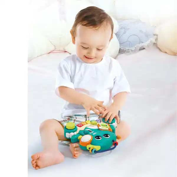 Игрушка пианино "Динозавр" 2 в 1