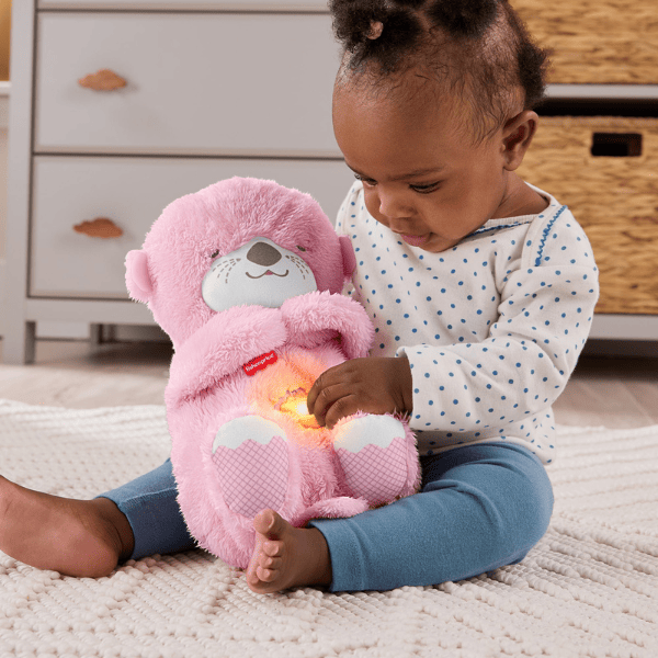 Jucărie de pluș „Vidră” de la Fisher-Price, cu lumină și sunet, roz
