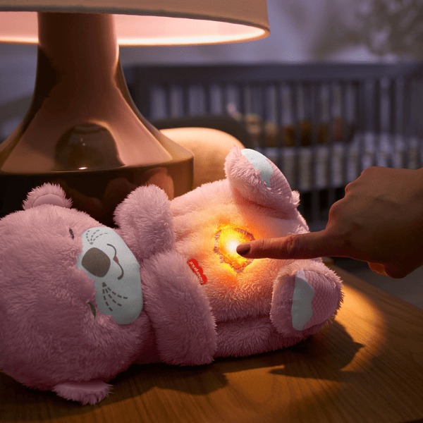 Jucărie de pluș „Vidră” de la Fisher-Price, cu lumină și sunet, roz