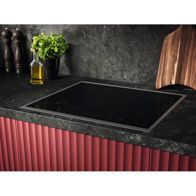 Plită cu inducție AEG TN64IA00XB Negru
7.2 kW | Vitroceramică
